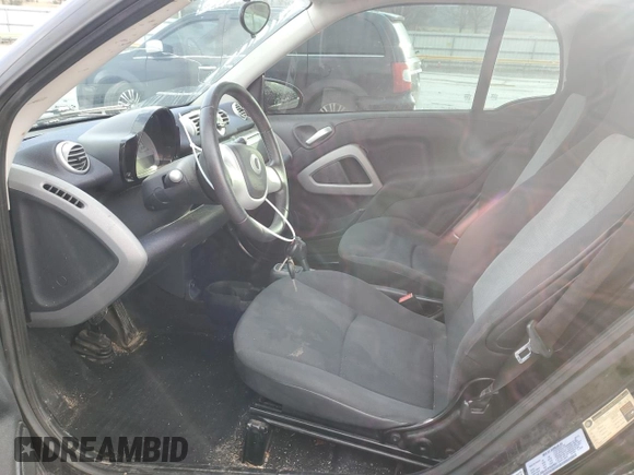 2012 Smart fortwo Pure with VIN WMEEJ3BAXCK568065, listed as a Copart auction lot 84398194 with 73,989 mi miles and Clean title. Bid and sale history available at DreamBid. Image 7.