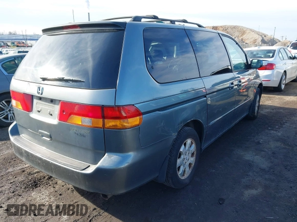 2002 Honda Odyssey EX-L z VIN 5FNRL180X2B022889, wystawiony jako IAAI lot #41546405 z przebiegiem 162 395 mil mil oraz . Historia ofert i sprzedaży dostępna na DreamBid. Obrazek 4.