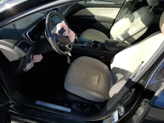 2015 Ford Fusion Energi Titanium with VIN 3FA6P0SU9FR233704, listed as a Copart auction lot 69322502 with 168,597 mi miles. Bid and sale history available at carsss.com. Image 7.