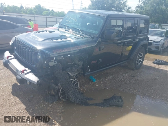 2024 Jeep Wrangler Rubicon with VIN 1C4PJXFG0RW271322, listed as a IAAI auction lot 42736647 with 32,319 mi miles and . Bid and sale history available at DreamBid. Image 17.