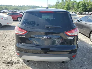 2016 Ford Escape SE with VIN 1FMCU9GX2GUC87008, listed as a Copart auction lot 58035524 with 50,700 mi miles and Salvage Title. Bid and sale history available at carsss.com. Image 6.
