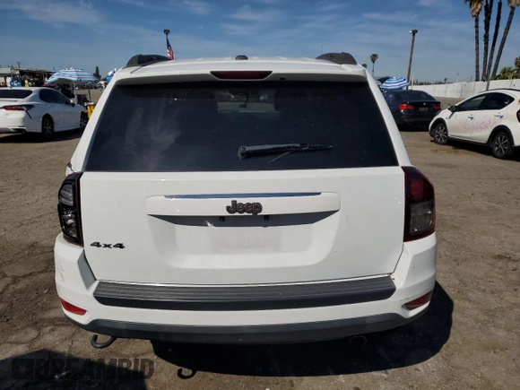 2016 Jeep Compass Sport with VIN 1C4NJDBB4GD511836, listed as a Copart auction lot 49989595 with 106,850 mi miles and Salvage Title. Bid and sale history available at carsss.com. Image 6.