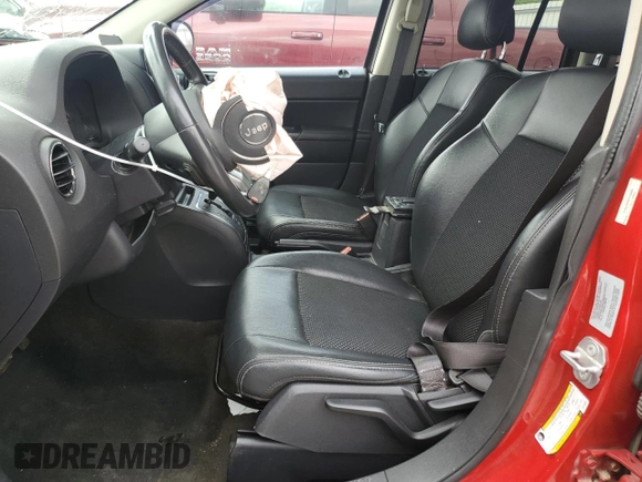 2016 Jeep Compass Sport SE with VIN 1C4NJDBB0GD759999, listed as a Copart auction lot 56983255 with 69,548 mi miles and Salvage title. Bid and sale history available at DreamBid. Image 7.