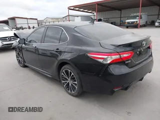 2020 Toyota Camry SE with VIN 4T1G11AK9LU946138, listed as a IAAI auction lot 42052004 with 99,583 mi miles. Bid and sale history available at carsss.com. Image 3.