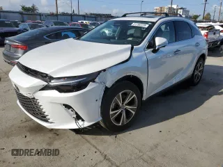 2024 Lexus RX with VIN JTJCHMAA0R2015035, listed as a Copart auction lot 51782225 with 9,880 mi miles and Salvage Title. Bid and sale history available at carsss.com. Image 1.