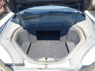2013 Tesla Model S with VIN 5YJSA1DN1DFP05317, listed as a IAAI auction lot 42086998 with 150,964 mi miles. Bid and sale history available at carsss.com. Image 10.