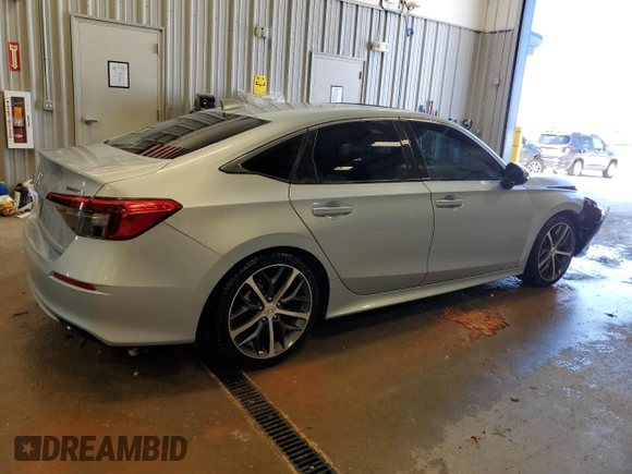 2022 Honda Civic Touring z VIN 2HGFE1F9XNH301080, wystawiony jako Copart lot #55320125 z przebiegiem 47 767 mil mil oraz Szkoda całkowita • Salvage title. Historia ofert i sprzedaży dostępna na DreamBid. Obrazek 3.