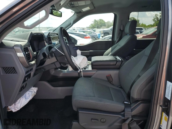 2024 Ford F-150 Lightning XLT with VIN 1FTVW3LK8RWG23783, listed as a Copart auction lot 58359625 with 5,864 mi miles and Salvage title. Bid and sale history available at DreamBid. Image 7.