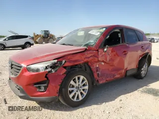 2016 Mazda CX-5 Touring with VIN JM3KE2CYXG0638247, listed as a Copart auction lot 53087305 with 0 mi miles and Salvage Title. Bid and sale history available at carsss.com. Image 1.