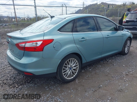 2012 Ford Focus SEL with VIN 1FAHP3H29CL248780, listed as a IAAI auction lot 41961348 with 120,719 mi miles. Bid and sale history available at carsss.com. Image 4.
