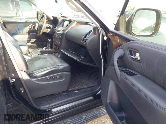 2012 Infiniti QX56 8-passenger with VIN JN8AZ2ND1C9715889, listed as a IAAI auction lot 41440893 with 221,212 mi miles and . Bid and sale history available at DreamBid. Image 5.