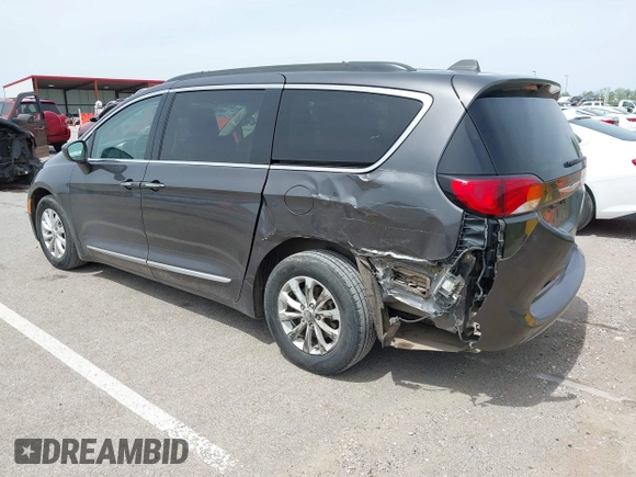 2017 Chrysler Pacifica Touring L with VIN 2C4RC1BG1HR540246, listed as a IAAI auction lot 42107768 with 151,268 mi miles and . Bid and sale history available at DreamBid. Image 3.