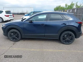 2024 Mazda CX-30 S Select Sport with VIN 3MVDMBBM3RM655084, listed as a IAAI auction lot 42213293 with 27,187 mi miles and . Bid and sale history available at carsss.com. Image 14.