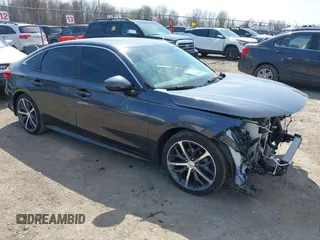2024 Honda Civic Touring z VIN 2HGFE1F96RH322661, wystawiony jako IAAI lot #42102132 z przebiegiem 20 806 mil mil oraz . Historia ofert i sprzedaży dostępna na DreamBid. Obrazek 1.