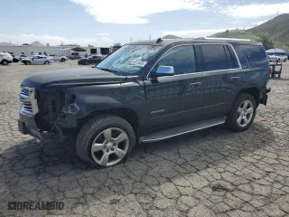 2015 Chevrolet Tahoe LTZ with VIN 1GNSCCKC4FR289839, listed as a Copart auction lot 49316485 with 179,311 mi miles and Salvage Title. Bid and sale history available at carsss.com. Image 1.