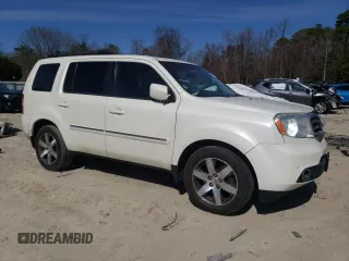 2012 Honda Pilot Touring with VIN 5FNYF4H97CB083346, listed as a Copart auction lot 48261855 with 127,723 mi miles and Salvage Title. Bid and sale history available at DreamBid. Image 4.