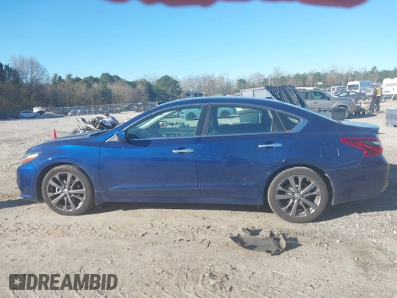 2018 Nissan Altima 2.5 SR with VIN 1N4AL3AP7JC291210, listed as a IAAI auction lot 41677670 with 142,994 mi miles. Bid and sale history available at carsss.com. Image 14.
