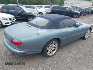2002 Jaguar XK with VIN SAJDA42CX2NA28816, listed as a IAAI auction lot 42029672 with 130,978 mi miles and . Bid and sale history available at DreamBid. Image 4.