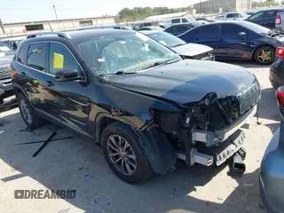 2019 Jeep Cherokee Latitude Plus with VIN 1C4PJLLB0KD358852, listed as a IAAI auction lot 41794999 with 112,667 mi miles. Bid and sale history available at carsss.com. Image 1.