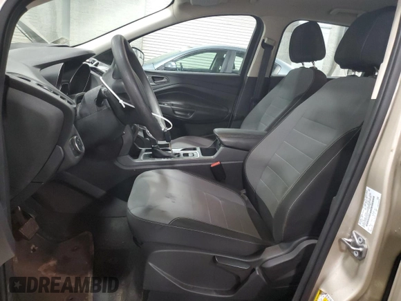 2017 Ford Escape S with VIN 1FMCU0F79HUC26012, listed as a Copart auction lot 65235285 with 98,682 mi miles and Salvage title. Bid and sale history available at DreamBid. Image 7.