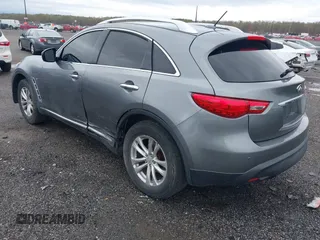 2016 Infiniti QX70 z VIN JN8CS1MW0GM400207, wystawiony jako IAAI lot #41952548 z przebiegiem 146 943 mil mil oraz . Historia ofert i sprzedaży dostępna na DreamBid. Obrazek 3.