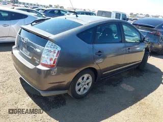 2008 Toyota Prius z VIN JTDKB20U883384556, wystawiony jako IAAI lot #42236131 z przebiegiem 71 463 mil mil oraz . Historia ofert i sprzedaży dostępna na DreamBid. Obrazek 4.