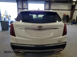 2025 Cadillac XT5 FWD Premium Luxury with VIN 1GYKNCRSXSZ106707, listed as a Copart auction lot 86919854 with 1,879 mi miles and Salvage Title. Bid and sale history available at DreamBid. Image 6.