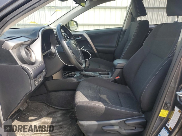 2018 Toyota RAV4 XLE with VIN JTMRFREV2JJ215776, listed as a Copart auction lot 51745205 with 52,009 mi miles and Salvage Title. Bid and sale history available at DreamBid. Image 7.