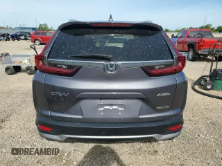 2020 Honda CR-V Touring with VIN 2HKRW2H99LH677964, listed as a Copart auction lot 61169915 with 65,915 mi miles and Salvage title. Bid and sale history available at DreamBid. Image 6.