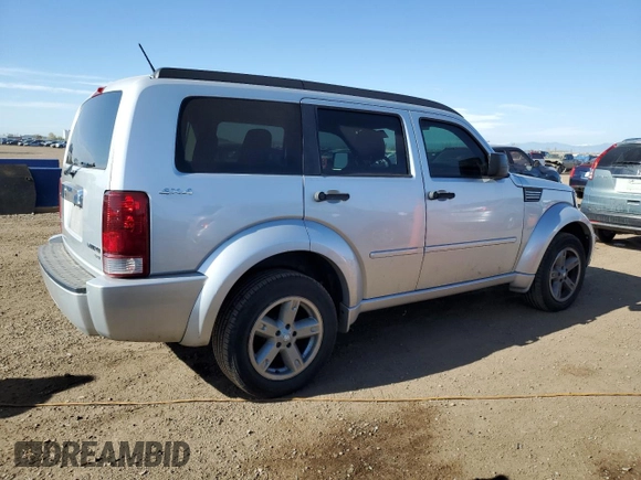 2010 Dodge Nitro SXT with VIN 1D4PU5GK1AW129356, listed as a Copart auction lot 53111155 with 158,818 mi miles and Salvage Title. Bid and sale history available at DreamBid. Image 3.