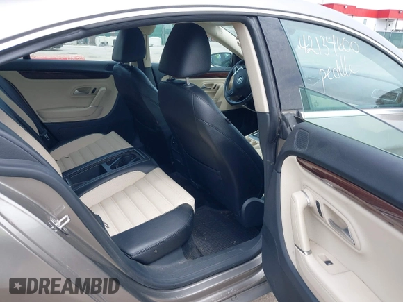 2012 Volkswagen CC Lux PZEV with VIN WVWHP7AN0CE552624, listed as a IAAI auction lot 42134600 with 122,543 mi miles. Bid and sale history available at carsss.com. Image 8.