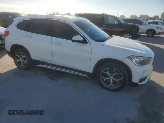 2019 BMW X1 sDrive28i with VIN WBXHU7C59K3H46543, listed as a Copart auction lot 49720815 with 97,836 mi miles and Clean Title. Bid and sale history available at carsss.com. Image 4.