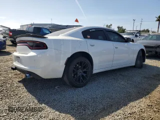 2020 Dodge Charger SXT with VIN 2C3CDXBG4LH162979, listed as a Copart auction lot 54392705 with 69,169 mi miles and Salvage Title. Bid and sale history available at DreamBid. Image 3.