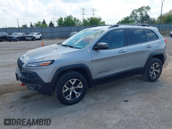 2015 Jeep Cherokee Trailhawk z VIN 1C4PJMBS5FW615313, wystawiony jako IAAI lot #42250873 z przebiegiem 148 008 mil mil oraz . Historia ofert i sprzedaży dostępna na DreamBid. Obrazek 17.