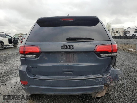 2018 Jeep Grand Cherokee Altitude with VIN 1C4RJFAG5JC219944, listed as a Copart auction lot 52030365 with 99,463 mi miles and Salvage title. Bid and sale history available at DreamBid. Image 6.