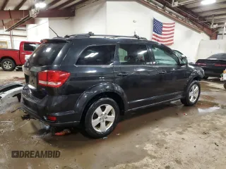 2012 Dodge Journey SXT z VIN 3C4PDCCG4CT188235, wystawiony jako Copart lot #88954495 z przebiegiem 159 825 mil mil oraz Czysty tytuł • Clean title. Historia ofert i sprzedaży dostępna na DreamBid. Obrazek 3.