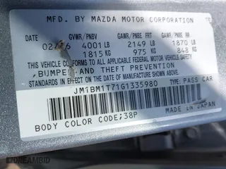 2016 Mazda Mazda3 i Sport with VIN JM1BM1T71G1335980, listed as a IAAI auction lot 42003186 with 131,015 mi miles. Bid and sale history available at carsss.com. Image 9.
