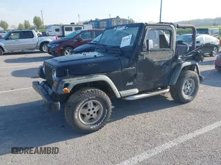 1997 Jeep Wrangler SE with VIN 1J4FY29P1VP449548, listed as a IAAI auction lot 41977699 with Not Provided miles and . Bid and sale history available at carsss.com. Image 2.