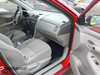 2009 Toyota Corolla with VIN JTDBL40E399050323, listed as a IAAI auction lot 42206910 with 180,935 mi miles. Bid and sale history available at carsss.com. Image 5.