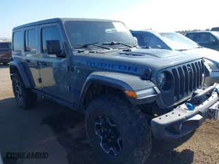 2022 Jeep Wrangler 4xe Unlimited Rubicon with VIN 1C4JJXR61NW160832, listed as a IAAI auction lot 39421092 with 32,347 mi miles. Bid and sale history available at carsss.com. Image 13.