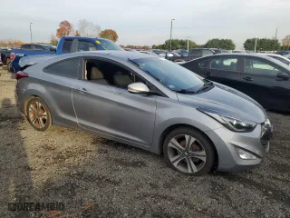 2014 Hyundai Elantra Coupe with VIN KMHDH6AH9EU026450, listed as a Copart auction lot 78877434 with 156,927 mi miles and Clean Title. Bid and sale history available at carsss.com. Image 4.