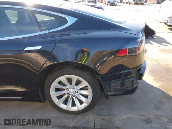 2017 Tesla Model S 60 with VIN 5YJSA1E19HF226094, listed as a IAAI auction lot 40931307 with 80,392 mi miles and . Bid and sale history available at DreamBid. Image 21.