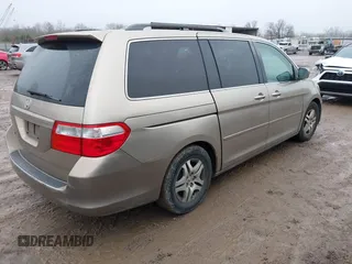 2006 Honda Odyssey EX with VIN 5FNRL38486B093156, listed as a IAAI auction lot 41109483 with 191,785 mi miles. Bid and sale history available at carsss.com. Image 4.
