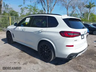 2023 BMW X5 sDrive40i with VIN 5UXCR4C04P9P85181, listed as a IAAI auction lot 41463840 with 20,819 mi miles. Bid and sale history available at carsss.com. Image 3.
