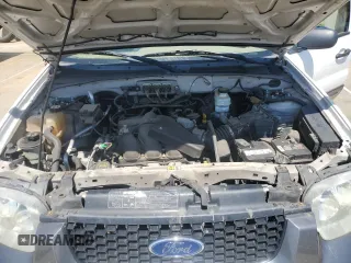 2006 Ford Escape XLT z VIN 1FMYU93176KB98889, wystawiony jako Copart lot #56388425 z przebiegiem 149 002 mil mil oraz Szkoda całkowita • Salvage title. Historia ofert i sprzedaży dostępna na DreamBid. Obrazek 12.