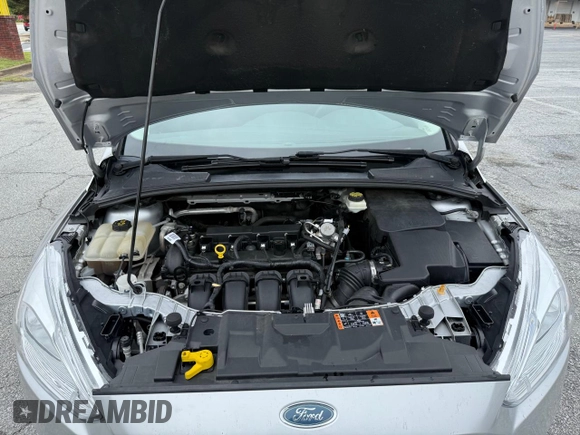 2017 Ford Focus SE with VIN 1FADP3F28HL28437, listed as a Copart auction lot 57904285 with 72,966 mi miles and Clean title. Bid and sale history available at DreamBid. Image 7.