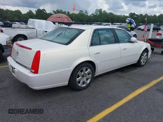 2007 Cadillac DTS Luxury I z VIN 1G6KD57Y67U123765, wystawiony jako IAAI lot #42495242 z przebiegiem 56 193 mil mil oraz . Historia ofert i sprzedaży dostępna na DreamBid. Obrazek 4.