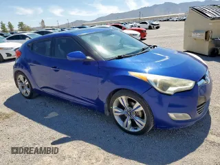 2013 Hyundai Veloster w/Red Int with VIN KMHTC6AD2DU150842, listed as a Copart auction lot 66378455 with 119,901 mi miles and Clean title. Bid and sale history available at DreamBid. Image 4.