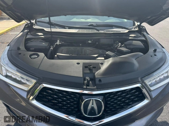 2018 Acura MDX Technology with VIN 5J8YD4H53JL020565, listed as a Copart auction lot 64906135 with 205,899 mi miles and Clean title. Bid and sale history available at DreamBid. Image 11.