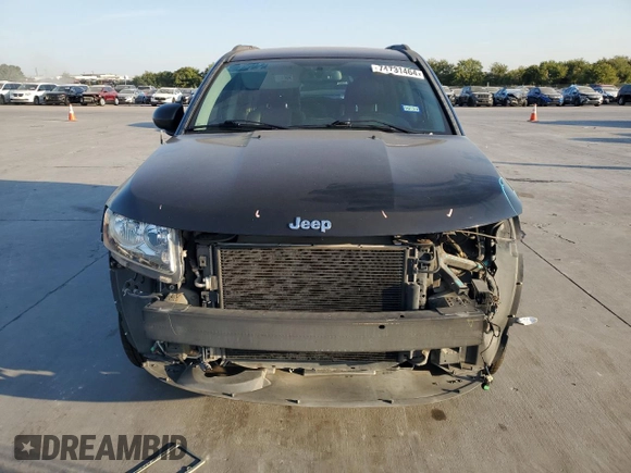 2015 Jeep Compass Latitude with VIN 1C4NJCEBXFD131484, listed as a Copart auction lot 74731464 with 76,048 mi miles and Salvage Title. Bid and sale history available at carsss.com. Image 5.
